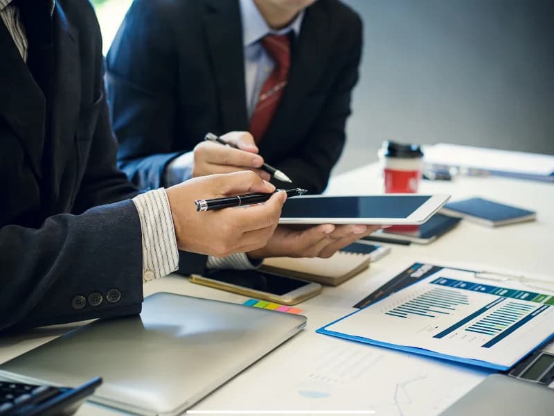 Our Team collaborating in a modern office